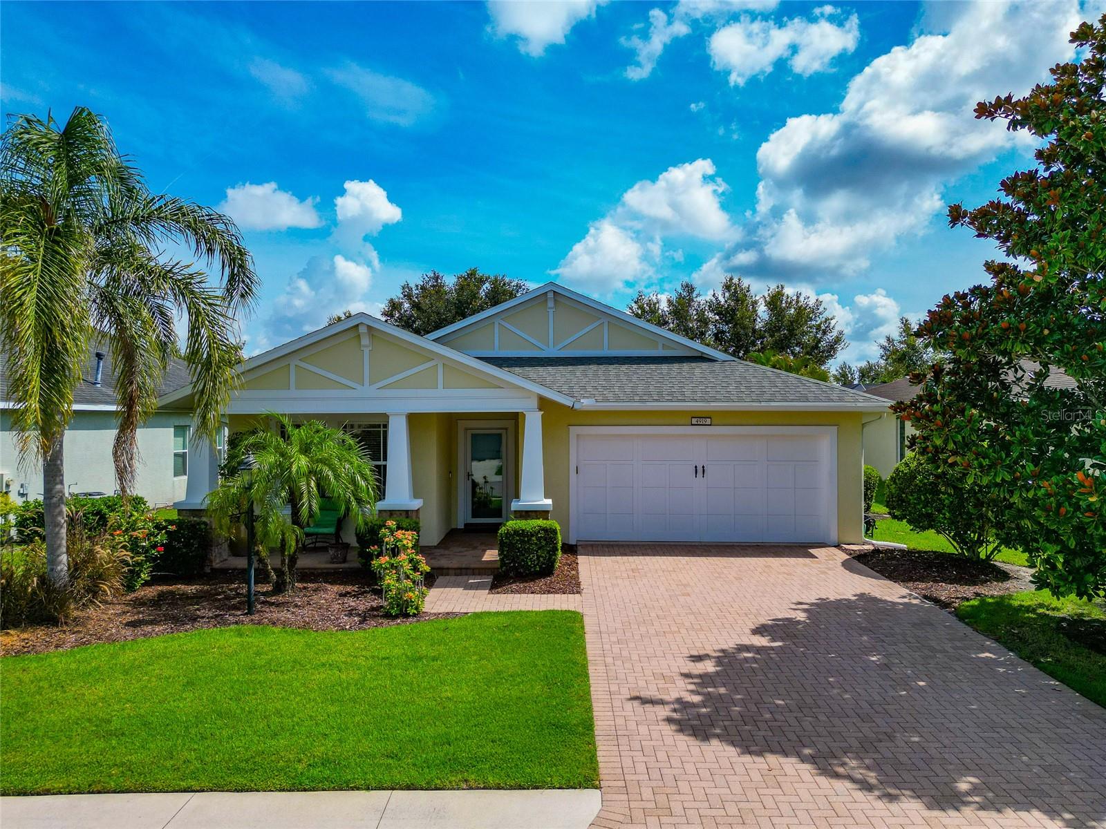Beautifully Maintained 3 Bed, 2 Bath Home Located in Central Park of Lakewood Ranch. Featuring an Open Floor Plan, the Kitchen Seamlessly Flows Into the Dining and Living Areas. The Kitchen Boasts Granite Countertops, a Gas Range, Breakfast Bar, and Ample Cabinetry. Enjoy Tranquil Water Views from Both the Spacious Primary Suite and Living Room. The Primary Bedroom Includes a Walk-In Closet and a Private En Suite Bath. The Two Additional Bedrooms Are Generously Sized and Share a Well-Appointed Full Bathroom. A Separate Office/Bonus Room Offers Versatility for Working from Home or As a Creative Space. Enjoy Breathtaking Sunrise Views Each Morning From the Enclosed Lanai. Recent Upgrades Include New Vinyl Flooring (2023), New A/C with UV Light (2024), Interior Painted (2023), and Exterior Painted (2021). The 2-Car Garage Features an Epoxy-Coated Floor, Storage Closets, and an EV Outlet/Charger for the Modern Vehicle. Central Park is a Gated Community with Playground, Park, Pavilion, Walking Trails, Dog Park, Splash Pad, Tennis Courts, and Sports Field. The Location is in Close Proximity to Lakewood Ranch Main Street, UTC, I75, Lakewood Ranch Medical Center, and Top Rated Schools.