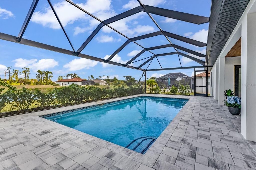 Photo of 1168 Boundary Boulevard, Rotonda West, FL 33947 (MLS # C7517339)