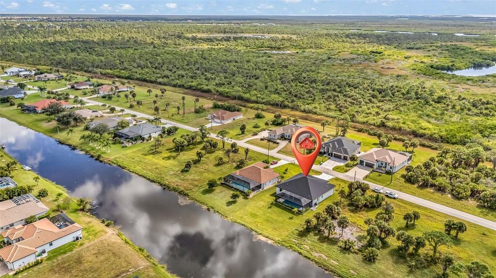 Photo of 1168 Boundary Boulevard, Rotonda West, FL 33947 (MLS # C7517339)