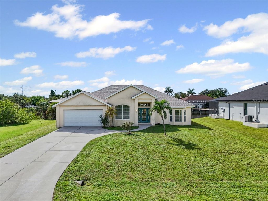 Photo of 9168 Arrid Circle, Port Charlotte, FL 33981 (MLS # D6143611)