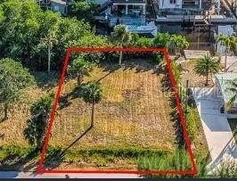 Build Your Waterfront Dream Home in North Naples, Imagine waking up and stepping out to your private boat dock, ready to embark on a Gulf adventure right from your backyard! This vacant, Gulf access lot in the highly sought-after Gulf Harbor neighborhood is your opportunity to build the custom home you've always envisioned. Gulf Harbor is a true "hidden gem" located west of US 41 in North Naples, less than 1.5 miles from the beautiful Wiggins Pass. This is a tranquil and secluded community boasts approximately offering easy Gulf access via the Cocohatchee River. You'll be out to open water through Wiggins Pass in just 15-20 minutes. Plus, the Vanderbilt Drive bridge was rebuilt in 2021, ensuring ample clearance for all your boating needs.