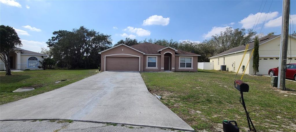 Photo of 1408 Hillsborough Way, Poinciana, FL 34759 (MLS # S5143241)