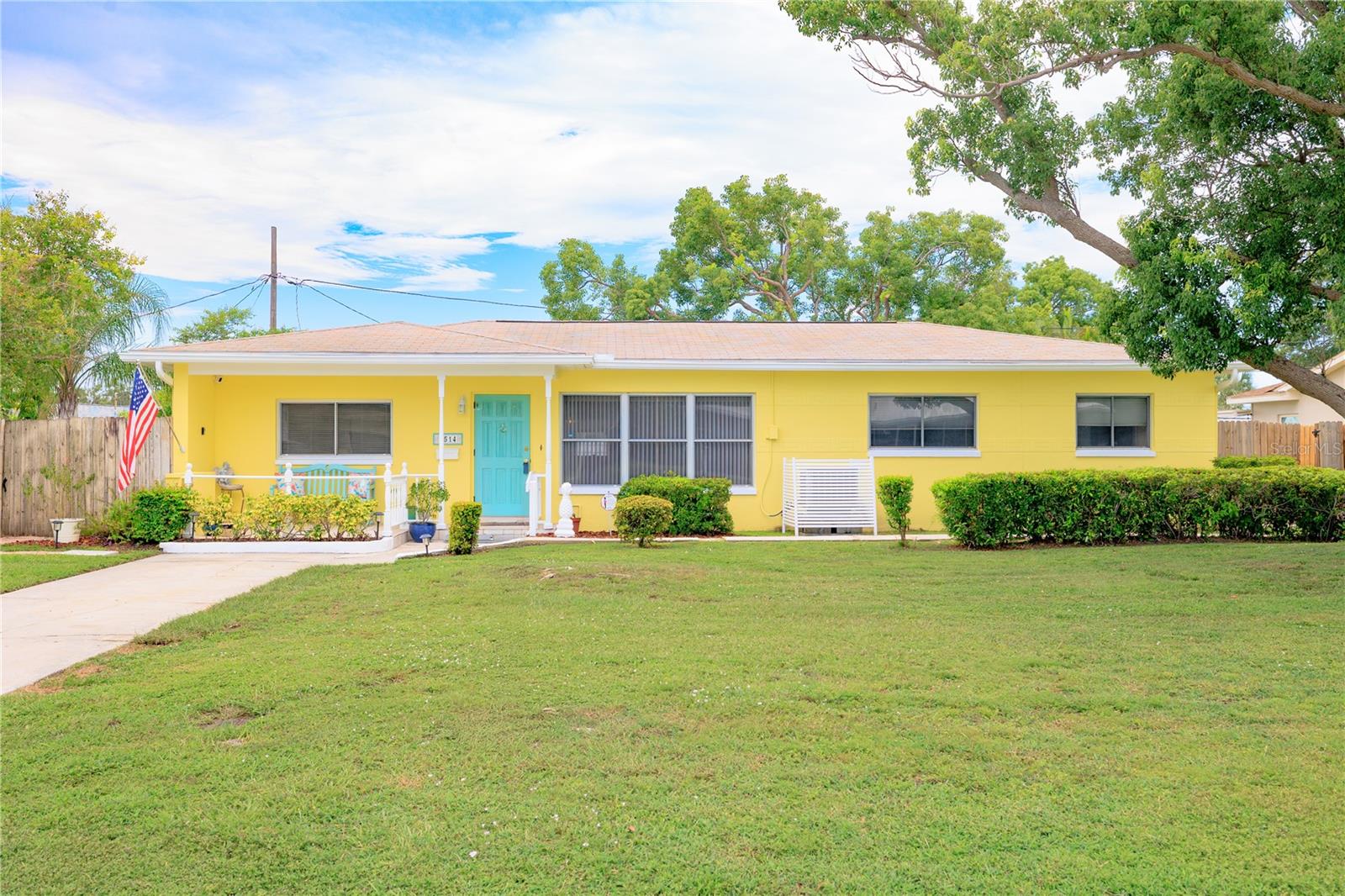 Spacious. Versatile. Full of Potential. Welcome to 7514 19th Ave N, nestled in the sought-after Jungle Country Club neighborhood of St. Petersburg! This 4-bedroom, 2-bath split floor plan home offers generous living space, multiple flex areas including a living room, family room, office/den, and an enclosed back porch—perfect for customizing to your lifestyle. The garage has been converted for even more usable space, while terrazzo floors lie beneath the current tile and laminate, ready to shine again. The exterior was freshly painted, with beautifully maintained trees for a clean and easy-care yard. You’ll also find an outdoor shed for extra storage and ¾ inch plywood storm shutters for every window and door (except the front). Roof was replaced 2015, HVAC 2012, and electrical has been updated. While the home could use some updating, it’s a solid opportunity to create your dream space in a quiet, established neighborhood just minutes from the beaches, shopping, and vibrant downtown St. Pete.