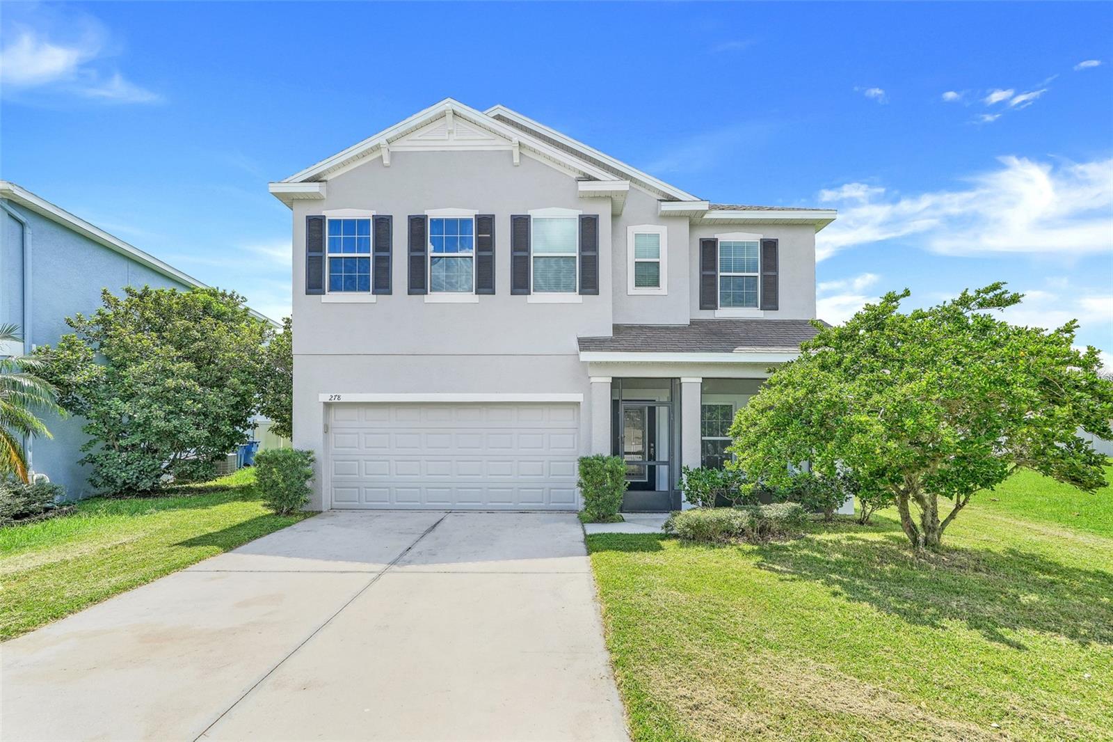 Welcome to your new home in the highly sought-after gated community of Waterside Pointe! Freshly painted inside (2024) and out (2025), this spacious residence shines with move-in ready appeal. The open-concept floor plan features a versatile den, a bright dining area, and a gourmet kitchen with granite countertops, stainless steel appliances, 42” cabinets, and a brand-new refrigerator. Upstairs, a flexible loft is ideal for a game room, media space, or home office. The primary suite offers a king-sized retreat with dual sinks, a tiled glass-enclosed shower, a walk-in closet, and an oversized linen closet. Secondary bedrooms each feature walk-in closets and are conveniently located near the upstairs laundry room with cabinetry. Guests will enjoy the full bath upstairs and the stylish half bath on the main floor. Step outside to an extended screened lanai in the rear (with a second screened lanai in front!), perfect for entertaining year-round. Waterside Pointe delivers resort-style amenities: clubhouse, pool, fitness center, yoga studio, playground, and private lake access with boat ramp. Outdoor enthusiasts will love the scenic 5K loop around Lake Memory plus nearby trails, fishing, biking, and boating. Just minutes to Downtown Groveland, Clermont, and the National Training Center. Don’t miss this opportunity—schedule your private showing today! Some photos have been digitally enhanced for marketing purposes.