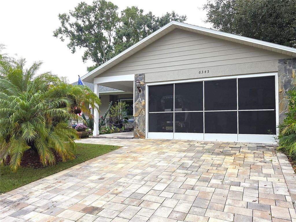Photo of 6345 Pine Meadows Drive, Spring Hill, FL 34606 (MLS # W7880245)