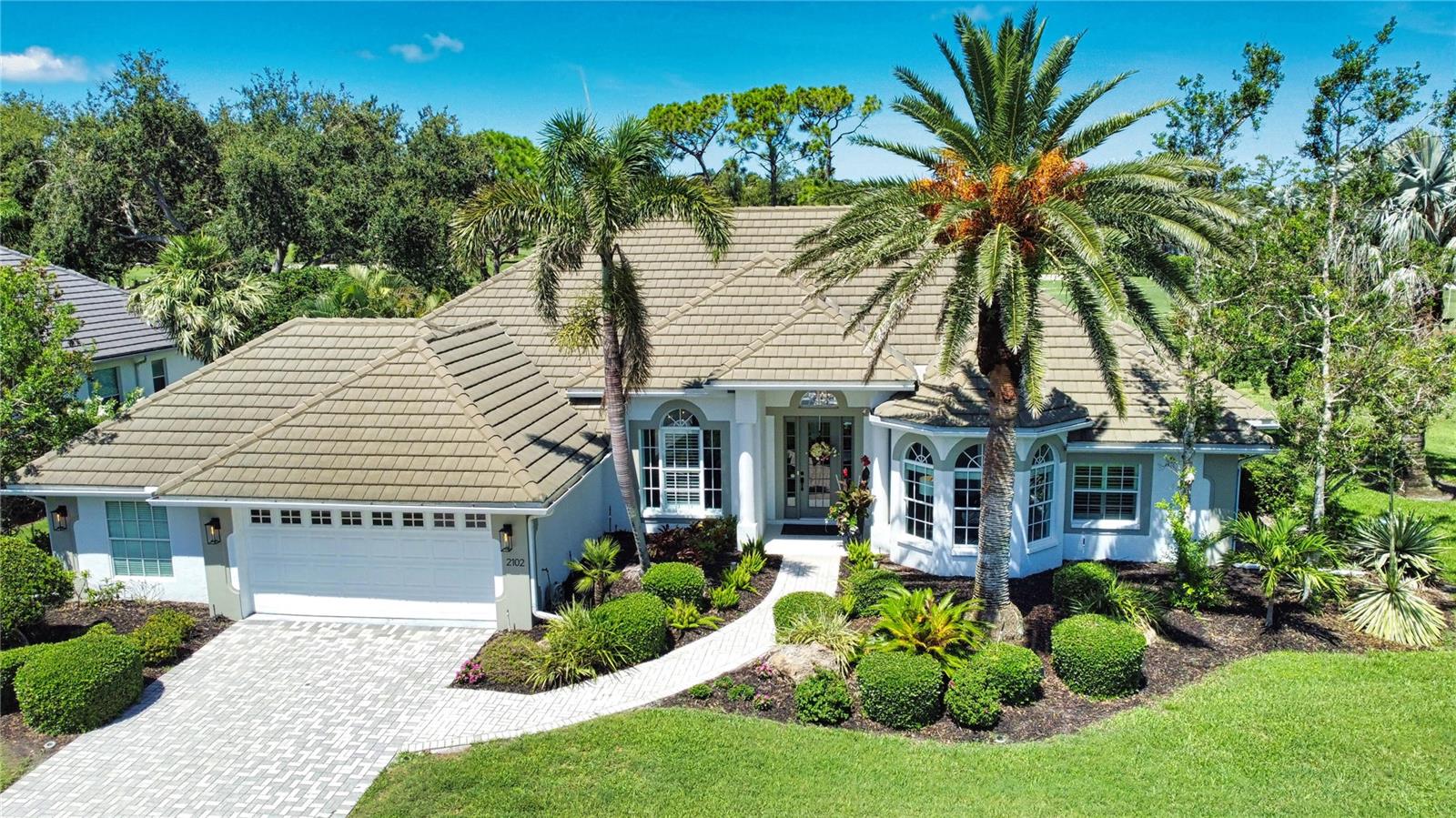 One of the best lots in Calusa Lakes, located on 18th green with gorgeous sunset views and private setting with no homes on north or west side. A fantastic floor plan includes of updates since purchased in 2023. All the big expenses are complete – ‘New Tile Roof in 2017. Pool/Spa new Pebbletec surface, travertine decking & re-screened cage in ’21. Water lines re-plumbed in ’22. A top-of-the line Lennox Elite variable speed heat pump was installed in ‘24, 5 ton unit including a 10 year warranty part & labor. Pool was converted to salt water, new pump/blower in ’23 (heater new '18). The kitchen has been updated with gorgeous Brazilian Leblon Quartzite natural stone countertops and shiplap accent. SS appliances all new since '20. New outdoor kitchen added with Blaze grill, SS drawers, garbage & double drawer refrigerator -Leblon Quartzite counters. All wallpaper removed and walls, trims, doors painted. New lighting, Alexa ceiling fans & plantation shutters throughout. Full bath new vanity with honed granite top, medicine cabinet with LED mirror with defogger.
Other unique features include - A beautiful free-form heated saltwater pool with 7' spa. Expansive Lanai with natural Travertine stone decking with two covered areas for dining & seating (plus electric awning) and a large sunning area. Two car garage – the 3rd bay was converted to a temperature-controlled room for storage, office, exercise room, etc. Garage has an additional storage area with heavy duty overhead storage rack, wall shelving and a large built-in storage cabinet. Incredible views from the 4 sliders (family room, kitchen, living room & master bedroom) leading to the Lanai and the expansive aquarium window in the kitchen breakfast room. Fantastic floor plan – provides function & privacy separating living room & dining room from the kitchen & family room. The primary suite is split from the 2 bedrooms on the opposite side of the home. The study can be used as a 4th bedroom – has built-in shelving/cabinetry and space for a closet or murphy bed. There are many pocket doors throughout the house for efficiency. Primary bedroom is expansive – walkout to lanai. The 3-way dressing mirror separates the His & Hers (Huge) closets. Ensuite bath with updated granite double vanity, jetted garden tub & large roman shower. Pocket door to private water closet. The 2 additional bedrooms have walk-in closets with organizational systems-the updated Jack & Jill bathroom is conveniently located between them. The laundry room has a utility sink, a large additional pantry and a utility closet. This gorgeous home provides so many spaces for entertainment; your visitors will not want to leave!
Calusa Lakes has a front & back security gate – gate guard from 7pm – 6am daily. Low HOA fees Qtrly. Calusa Lakes Golf course offers optional golf memberships. No CCD. Not in flood zone and no hurricane damage. Located 6 mins. to Nokomis Beach and the new Sarasota Memorial Hospital. Tons of great restaurants in Nokomis. Publix, Aldi’s, Starbucks, Walgreen, post office located within 5 minutes. Calusa Lakes is a fabulous neighborhood with an impressive front entry flanked by huge waterfalls, gorgeous landscape, spacious lots, sidewalks and lamp posts. A neighborhood that takes pride in keeping it aesthetically pleasing. This home has received the face-lift & expensive updates that others didn't do
