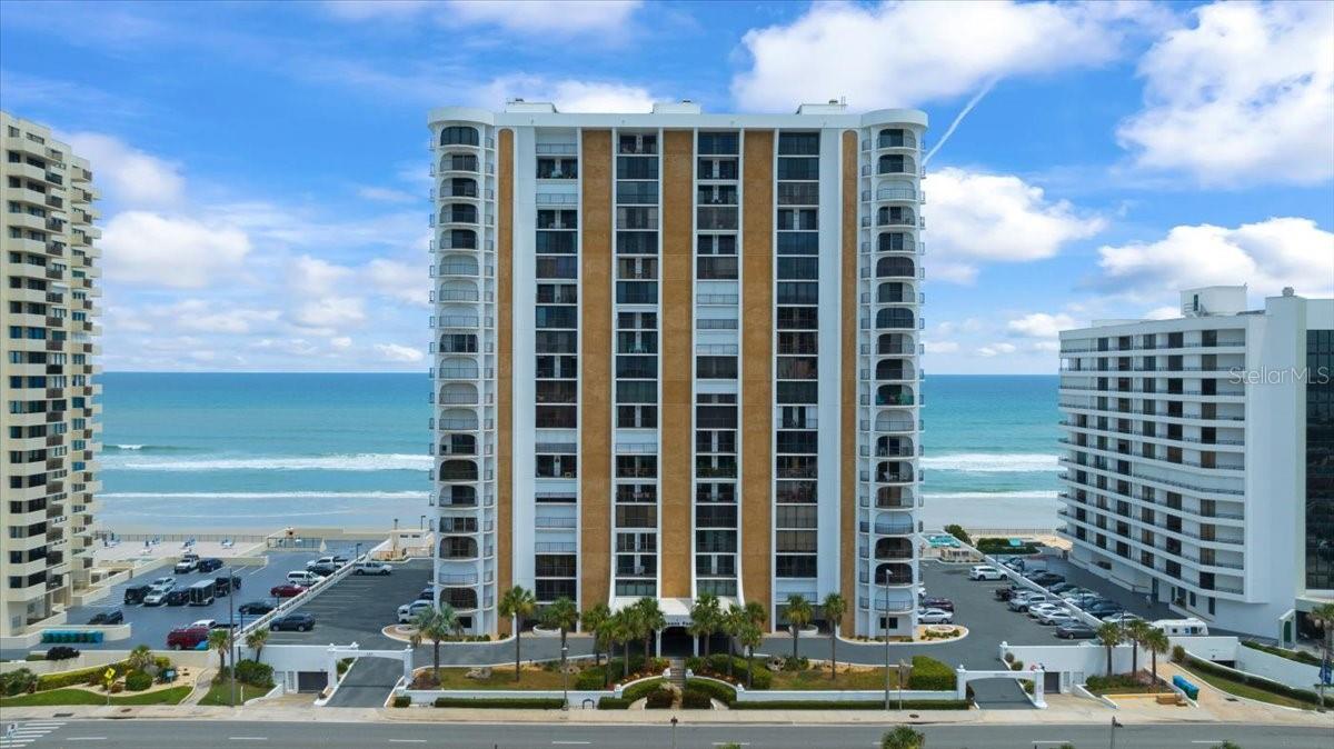 Spectacular Sunrise-to-Sunset Views! Experience the coastal lifestyle from this beautifully updated 5th-floor residence in the coveted Oceans Four Condominium. This exceptional 2 bed-2 bath unit offers a breathtaking perspective of Daytona Beach Shores, with direct Atlantic Ocean views to the east and serene Intracoastal Waterway views to the west. The updated interior is designed for modern comfort and style, creating a move-in-ready sanctuary. The spacious living area flows seamlessly, leading to your east-facing balcony with views of the ocean where you can enjoy the waves, boats, birds, and marine life. The bright kitchen features solid wood oak cabinets, newer, upgraded appliances and light Quartz countertops. Off the kitchen is an elegant dining area with ample space for your dinner guests. The spacious primary bedroom is well-appointed with two walk-in closets and a stylish ensuite bathroom. The primary bath features comfortable dual vanities with abundant counterspace and a large, updated shower with custom glass and tile work. The spacious guest room features a built-in bookcase and a walk-in closet. The updated guest bathroom has your ensuite laundry for your convenience. Enjoy the elegant crown moldings, new solid, raised panel, interior doors, and light ceramic tile flooring throughout the entire unit.
There is ample storage in this unit, and it also comes with two storage cages downstairs for all your belongings and beach gear.
Common areas include both indoor and outdoor pools, a spa, separate dry saunas for him and her, a well-equipped fitness center, a vibrant social room with a full kitchen, a library, a game room, and billiards area.
Located in the heart of Daytona Beach Shores, you are just moments away from dining, shopping, and recreation. "Life is better here in Daytona Beach Shores!" This is a front-row seat to some of the best views on the coast. Don't miss this opportunity to own a piece of paradise where you can watch both the sun rise and set over the water every day. Schedule your private showing today!
Furniture is negotiable.
**Information in MLS is deemed reliable but not guaranteed and should be independently verified by the buyer or buyer's agent.