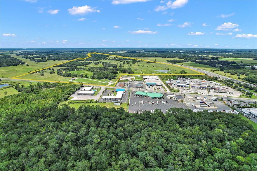 REDUCED - Industrial Land Offering for 315+/- Acres with utilities available to site by City of Wildwood per service agreement. Property Fronts I-75 with over 6,500'+/- linear Ft of frontage that include billboards and with FDOT 104,500 avg trips per day plus 1,820'+/- linear Ft of frontage on SR 44 off of the I-75 exit # 329 where the Florida Turnpike meets and crosses I-75. Sale includes "Spring Water Permit" for 496,000+/- gallons of water per day. Located in Sumter County and less than an hour to Orlando or Tampa this is the "Transportation Hub" of Central Florida". “Major transportation arteries include Interstate 75, the Florida Turnpike, US Highway 301, and State Roads 44, 48, 50, 470 and 471. Add our proximity to no fewer than 3 deep-water seaports and 3 international airports, and you’ve hit the transportation trifecta of land, sea and air." - Sumter County Florida EDC. Offering is an assemblage of 3 parcels C34-015, C27-028 & C27-034 and also available are 3 more adjoining income producing parcels. Plus this offering is just a few miles from The Villages the largest retirement community in the United States spanning 3 counties and still growing with a population over 140,000+ and completely accessible by golf cart. Sumter County EDC is aggressive in smart growth which includes Old Dominion's newest logistics' hub that just broke ground next to the property and Werner & Saia are both planning sites on the East side of I-75. Entry onto property without an appointment is trespassing. All information is believed accurate but not guaranteed or warranted and subject to change without notice . NDA will be required for any additional information