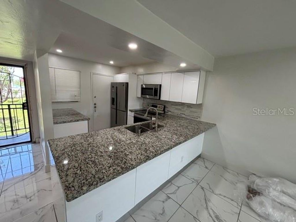 Photo of 1400 NE 191st Street #309, Miami, FL 33179 (MLS # S5150350)