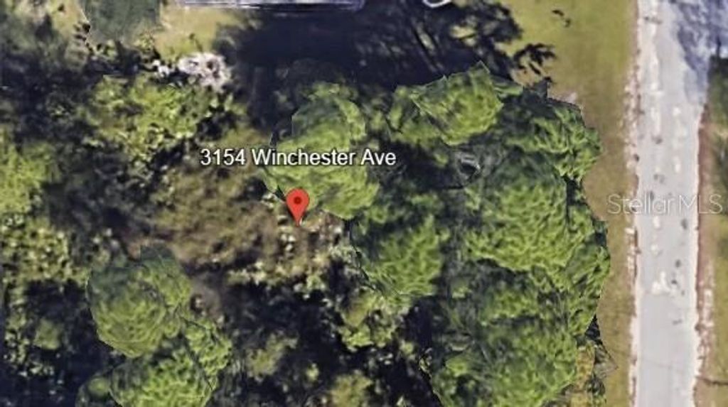 Photo of 3154 Winchester Avenue SE, Palm Bay, FL 32909 (MLS # OM712018)