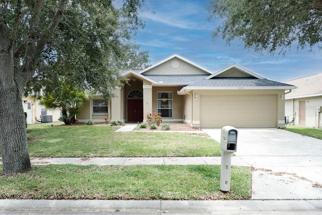 Photo of 1282 Paradise Lake Drive, Tarpon Springs, FL 34689 (MLS # TB8468597)