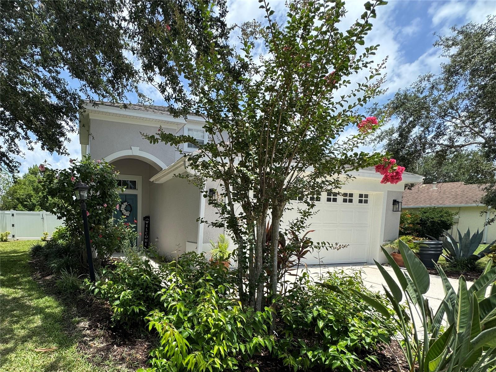 MOTIVATED SELLER! WELCOME HOME to this beautiful 2-story, 4 Br, 2.5 Ba POOL / SPA home in Greenbrook Terrace in Lakewood Ranch, situated on a pie shaped lot overlooking a peaceful pond. This home has been lovingly maintained. Charming updates throughout include new continuous Luxury Vinyl Plank flooring throughout the house, new tile and quartz countertops in two bathrooms, wood cabinets and brand new GE Cafe appliances in kitchen with tile backsplash, granite counters, upgraded light fixtures, freshly painted interior, plus a NEW ROOF (2025) and new exterior paint (2025). Pool / Spa and extended lanai area was built in 2023. Enjoy a fantastic fully fenced back yard, an outdoor kitchen with beverage fridge, sound system and screened in pool. All bedrooms are located on the second floor. First floor has a cubby system at the door, built in bar in the formal living room, half bath and laundry room just off the kitchen. Lots of storage space is available in a large closet underneath the stairs. The spacious master bedroom offers two closets (one is a walk in), garden tub and shower, and a double vanity. Greenbrook Park and Adventure Park are right around the corner. Nearby, there are two playgrounds, picnic pavilion, basketball, in line skating, soccer fields, baseball, dog park, walking trails and more! Zoned for McNeal Elementary, Nolan Middle, and Lakewood Ranch High School, and with an HOA fee of just $115/year, this home is a must-see!