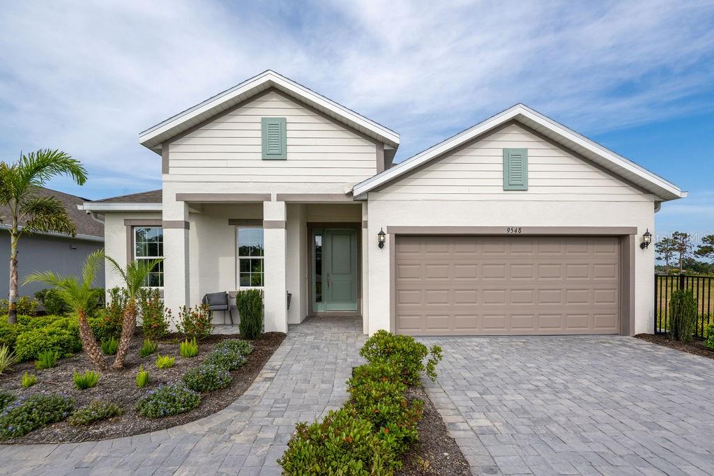 Model Home Available for Leaseback. Welcome to Brighton, conveniently located on Jacaranda Blvd near Center Rd, offering easy access to shopping, dining, and medical facilities. Enjoy quick commutes to Sarasota, Tampa, and Ft. Myers via nearby I-75. Brighton is just 5 miles from Venice’s beautiful beaches and vibrant downtown, and is surrounded by numerous golf courses. With low fees, natural preserves, and serene water views, Brighton offers an exceptional lifestyle. This beautifully upgraded Margate model home blends sophisticated style with everyday comfort. Featuring plank tile flooring throughout, the open-concept layout centers around a gourmet kitchen with upgraded quartz countertops and a large island perfect for casual meals—open to the living space for effortless entertaining. Enjoy breathtaking water views from your spacious living areas. The owner’s suite serves as a luxurious retreat, offering a walk-in shower, his and her walk-in closets, and refined designer finishes. Additional highlights include a large utility room offering ample storage and functionality for everyday living. The home is loaded with upscale features such as designer lighting fixtures, built-in speakers, custom wall paneling, and stylish décor accents throughout. Professionally designed with both elegance and livability in mind, this is truly a must-see opportunity!