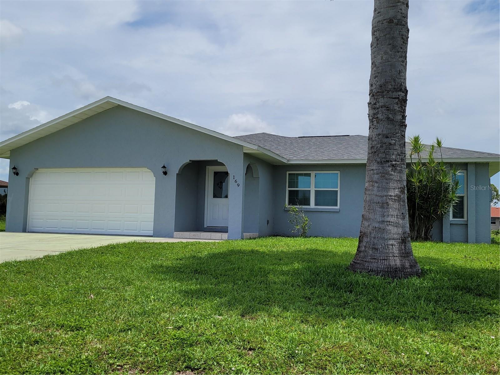 This beautiful and spacious home has two bedrooms, two baths, two car garage and an additional all-season Florida room. It is a split bedroom floorplan. The newly renovated kitchen has plenty of cabinet space. The primary bedroom has a walk-in closet, while the primary bathroom has a step-in shower. The guest bath has a tub/shower combination. Tile flooring in the main living area and vinyl plank flooring in the 2 bedrooms and lanai. Enjoy your morning coffee from the lanai, looking out at the tranquil water beyond. The back yard is fenced in. Five golf courses, 2 walking/biking trails, and a community park with picnic pavilion, tennis courts, and playground are all located in this quiet community of Rotonda West. The beautiful Gulf beaches of Englewood and Boca Grande are just a short drive away.