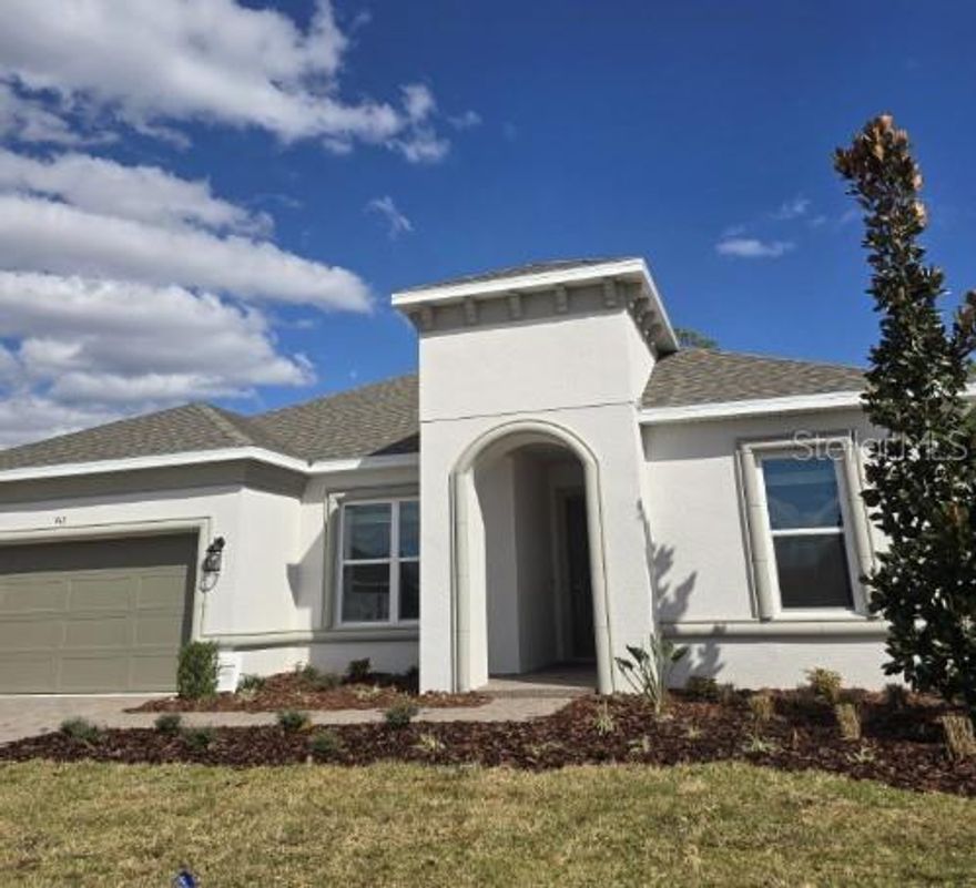 What's Special: Wooded View | Dedicated Home Office. New Construction - Ready Now! Built by Taylor Morrison, America's Most Trusted Home Builder. Welcome to the Letizia at 943 Tassleflower Trail in Esplanade at Center Lake Ranch. This thoughtfully designed layout features two secondary bedrooms and a full bathroom off the foyer, with a spacious study to the right. Down the hall, you'll find another secondary bedroom, a full bathroom, laundry room, and access to the garage. The heart of the home is the expansive gathering room, which flows seamlessly into the gourmet kitchen and casual dining area, perfect for hosting family and friends. The private primary suite, tucked off the gathering room, offers a luxurious en-suite bathroom and a walk-in closet you'll love. Additional Highlights Include: Gourmet kitchen, study, outdoor kitchen rough-in, washer, dryer and refrigerator included, and whole house blinds.  MLS#J998265

Experience resort-style living in St. Cloud, Florida, at Esplanade within the gated Center Lake Ranch community. With homes offering stunning nature and pond views, every detail is designed for peace and relaxation. Enjoy wellness-focused amenities like a pool, spa, fitness center, and movement studio. Stay active with pickleball, bocce, or strolls through the Bark Park, while concierge services and community events keep life exciting. With planned trails, parks, and an 11-acre Central Park, Esplanade offers a serene, nature-filled lifestyle with easy access to major roads.