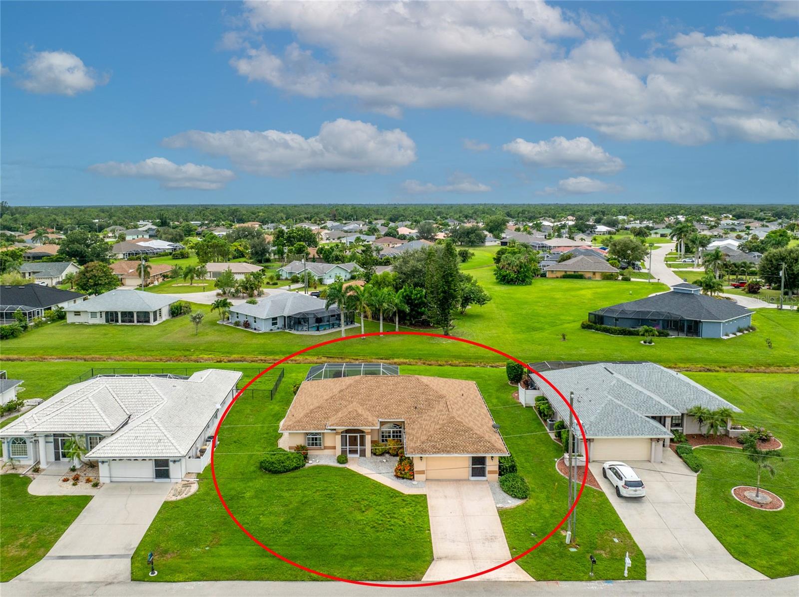 Welcome to 7413 Sweet Alyssum - discover this inviting 3-bedroom, 2-bathroom home located in the beautiful deed-restricted community of Burnt Store Meadows in Punta Gorda. Offering 1,930 square feet under air, the open great room floor plan is perfect for both everyday living and entertaining. The kitchen provides abundant cabinetry and a convenient layout, opening to the main living space and offering views of the peaceful private greenbelt.
The spacious primary ensuite features a large area for a sitting room with [pocketing slider to the lanai, and bathroom with dual vanities, relaxing garden tub, and separate shower, creating a true sanctuary.
Step outside to your own tropical escape with a fabulous sparkling pool and spacious lanai, ideal for relaxing or hosting friends and family. Additional highlights include accordion hurricane protection for peace of mind and a brand-new roof completed April 30, 2025.
All this, just minutes from downtown Punta Gorda where you’ll enjoy a vibrant mix of waterfront dining, boutique shopping, and the charm of Fishermen’s Village.