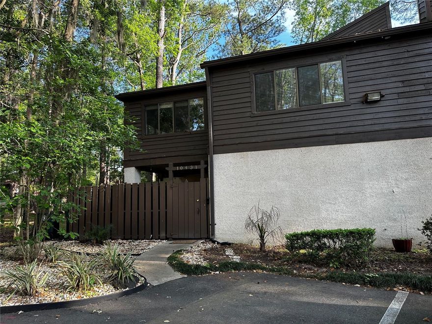 Charming 3 bedroom/2 1/2 bath unit in Townhomes of BIGTREE. Enter by your private patio. Large rooms, restored Parquet flooring, All bedrooms are upstairs. Sliders in the kitchen and the living room open to large porch for large exterior entertainment area