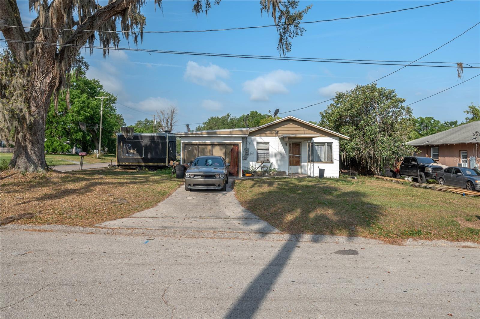 MOTIVATED SELLER! PRICE REDUCED! Fixer-Upper on a Corner Lot in Bartow, FL! Attention investors and DIY enthusiasts! This 3-bedroom, 2-bathroom block home in Bartow is brimming with potential. Situated on a spacious corner lot, this property offers a solid foundation for those looking to bring their vision to life.
Inside, you'll find an open-concept kitchen, eating area, and living room, creating a welcoming and functional layout. With the right repairs and upgrades, this home could truly shine! Don’t miss this opportunity to transform this diamond in the rough into a fantastic investment or personal residence. Schedule your showing today! Sold AS-IS – No Repairs Will Be Made. Cash Only Offers. *See realtor remarks for additional information*