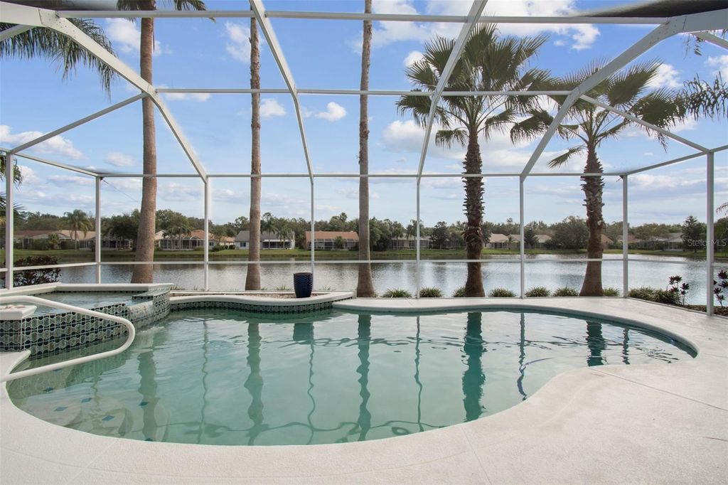 Photo of 10101 Whisper Pointe Drive, Tampa, FL 33647 (MLS # TB8457279)