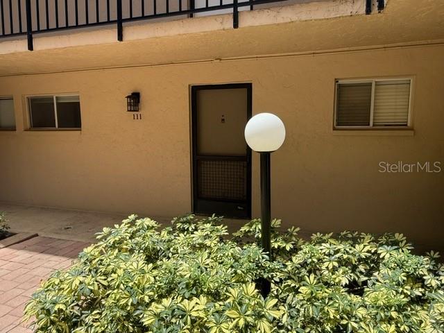 Looking for a lovely condo to call your own? Pinewood Village offers a cozy residence to live in. This Freshly painted, very clean, 2 bedroom, 2 bathroom home will bring comfort for you and your loved ones. The unit is located on the first floor which is ideal for those who are not in love with stairs. The community pool is right outside for your convenience. Ideally located off Proctor Rd. restaurants, shopping, medical facilities, good school districts & fine beaches are close by. In your spare time you are more than welcome to enjoy the large community swimming pool and fitness center. HOA fee/features include basic cable, water, pest control, maintenance grounds, maintenance exterior, fitness center, clubhouse, and shuffleboard courts. There is one designated parking spot per unit. Schedule your showing today.