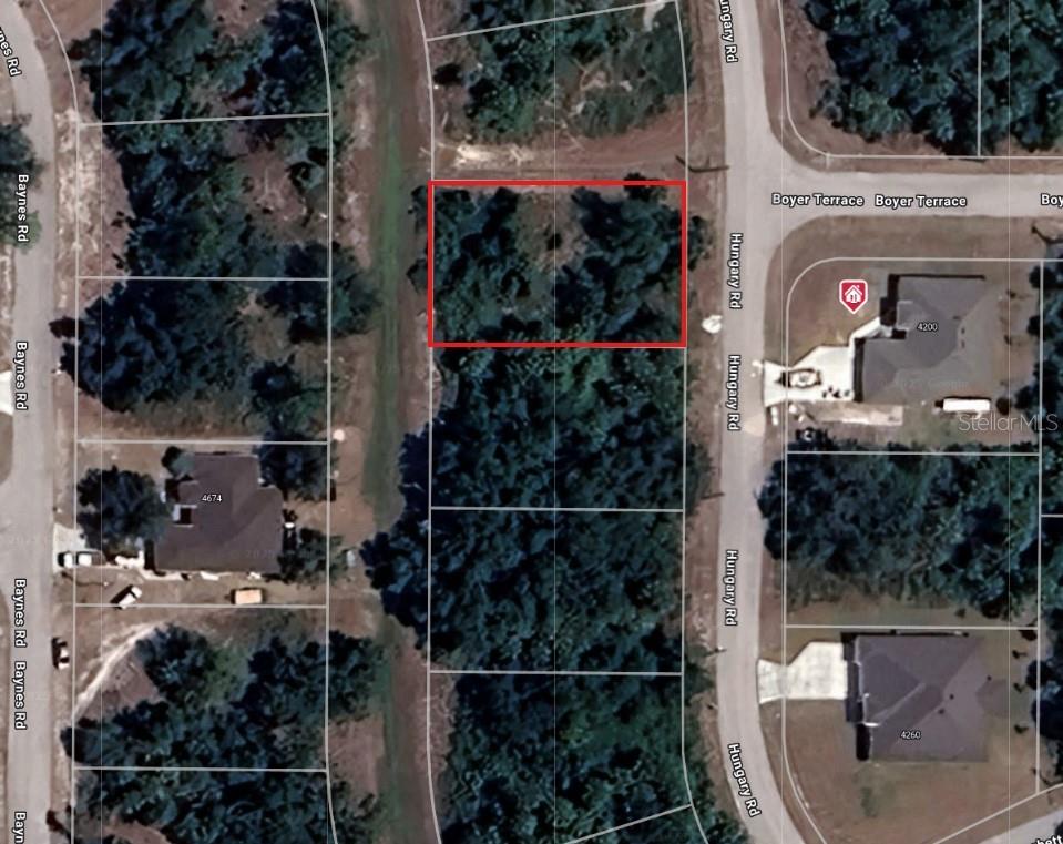 Great standard lot NOT IN A FLOOD ZONE in North Port. 15 Minutes to I-75 and 20 Minutes to Port Charlotte Beach. Electric nearby. Build your dream home in a growing area! Lot is to the West of house on 4200 Hungary Rd.