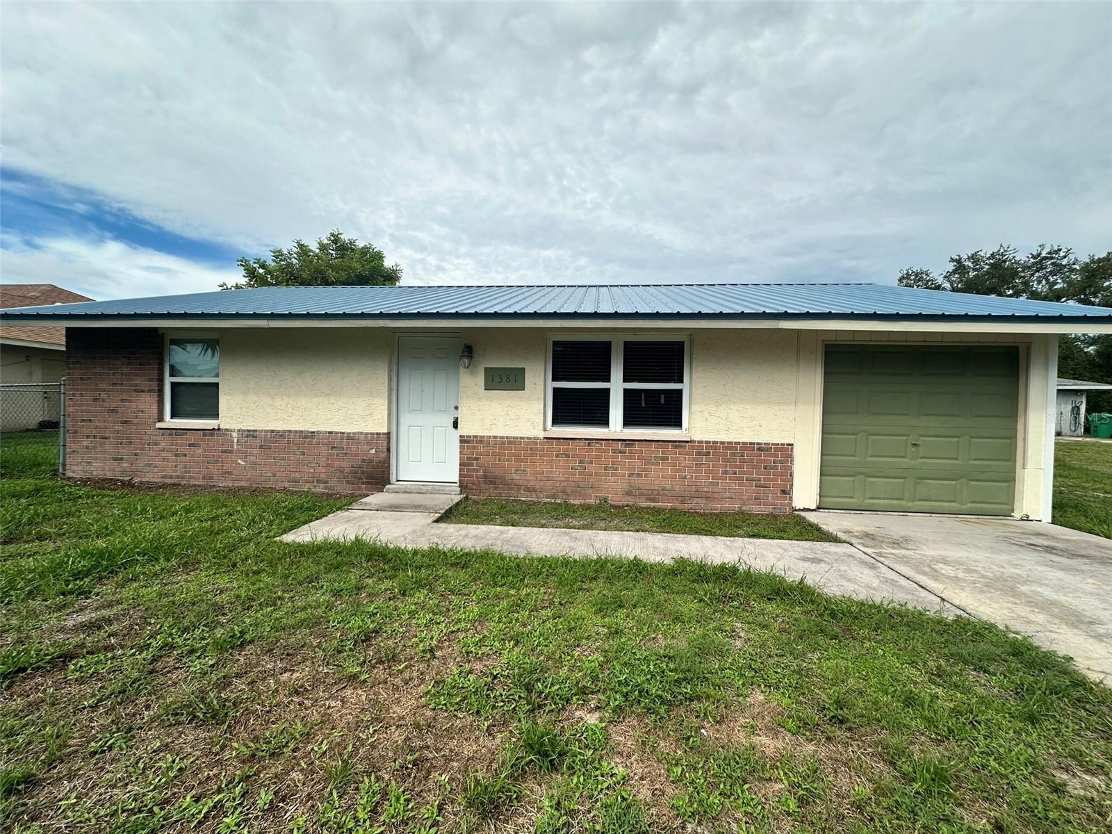 Spacious layout 2 bedroom, 1.5 baths, large kitchen. This property features a large screened in lanai that overlooks a large backyard featuring a deck, and a bench overlooking a canal. Relax your mind and connect with nature.