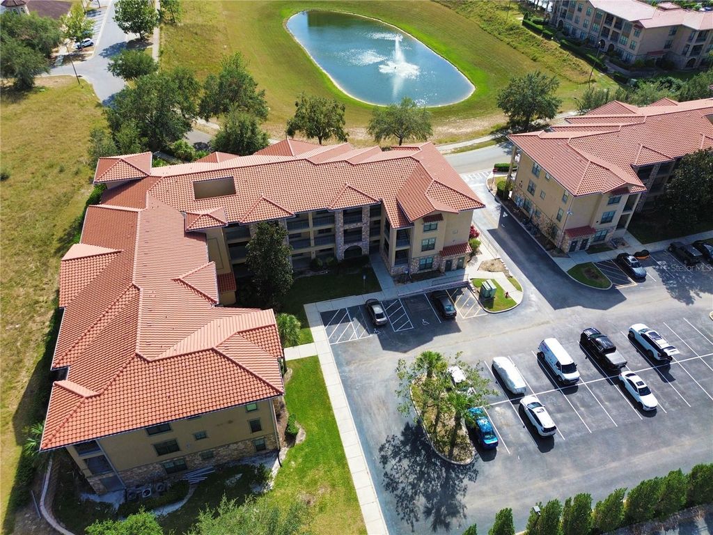 Photo of 909 Charo Parkway #1016, Davenport, FL 33897 (MLS # S5142823)