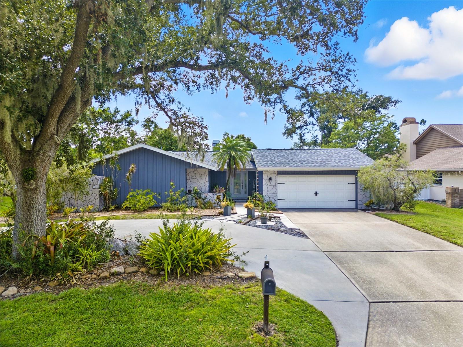 PARADISE AWAITS in this FULLY RENNOVATED 4-Bedroom / 2-Bathroom POOL HOME with a 2-car garage near Siesta Key Beach! All of the BIG TICKET ITEMS ARE NEW! Step into the perfect blend of coastal charm and modern luxury where every detail has been thoughtfully upgraded for style, comfort, and peace of mind, and pride of ownership sings throughout! Fully equipped with all Weathertite IMPACT WINDOWS and SLIDING DOORS (2015) that flood the open floorplan with natural light while keeping you secure, and keeping those insurance costs at a minimum. A NEWER ROOF (2019) and NEW AC (2021) ensure years of worry-free living, while the whole house has been COMPLETELY REPLUMBED with dedicated lines to each faucet adds efficiency you can feel. The heart of the home features a stunning two-sided quartz rock wood-burning FIREPLACE, creating a warm and inviting focal point for both living rooms (the Great Room and the Family Room) and both dining areas. The kitchen is the bridge between the main living areas, and is just as expansive as it is elegant! There is even an outdoor screened in dining room, perfect for enjoying a meal with friends, or a prime spot for a potted herb garden! This massive floorplan is perfect for entertaining guests or your families needs with open areas, but separate living rooms! Luxury vinyl plank flooring (2020) flows seamlessly throughout, leading to a fully remodeled master suite retreat with a FREESTANDING LUXURY SOAKING TUB, separate glass-enclosed shower, dual vanity sinks, and spa-like finishes! Step outside and savor Florida living at its finest. The sparkling pool, resurfaced in 2016 and enclosed with a newer screen cage (2015), is ready for endless days of sunshine. The huge fully fenced backyard offers privacy and space for gatherings, pets, or simply relaxing under the palms. The upgraded circular driveway (added in 2021) welcomes you with extra parking and undeniable curb appeal! With a highly sought after location just minutes from Siesta Key Beach, St. Armand's Circle, and Sarasota’s best dining, shopping, schools and cultural attractions, this home gives you the indoor/outdoor lifestyle you have been craving! With a LOW HOA, NO CDD fees, and SHORT-TERM RENTAL readiness, this home offers unmatched flexibility—whether you’re seeking a forever home, a seasonal getaway, or a high-demand vacation rental. Plus, you’re moments from Sarasota Memorial Hospital, SRQ Airport, the Legacy Trail, and hundreds of restaurants, cafes, and boutiques. This is more than a home—it’s your Sarasota DREAM, move-in ready and waiting. Schedule your private showing today and start living where others vacation.