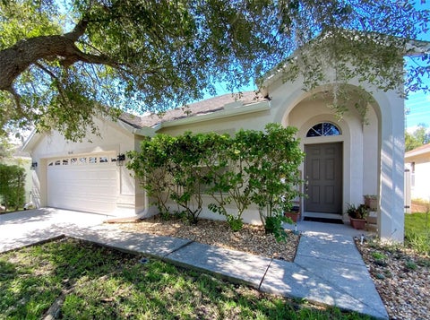 Photo of 4041 Langdrum Drive, Wesley Chapel, FL 33543 (MLS # TB8553298)