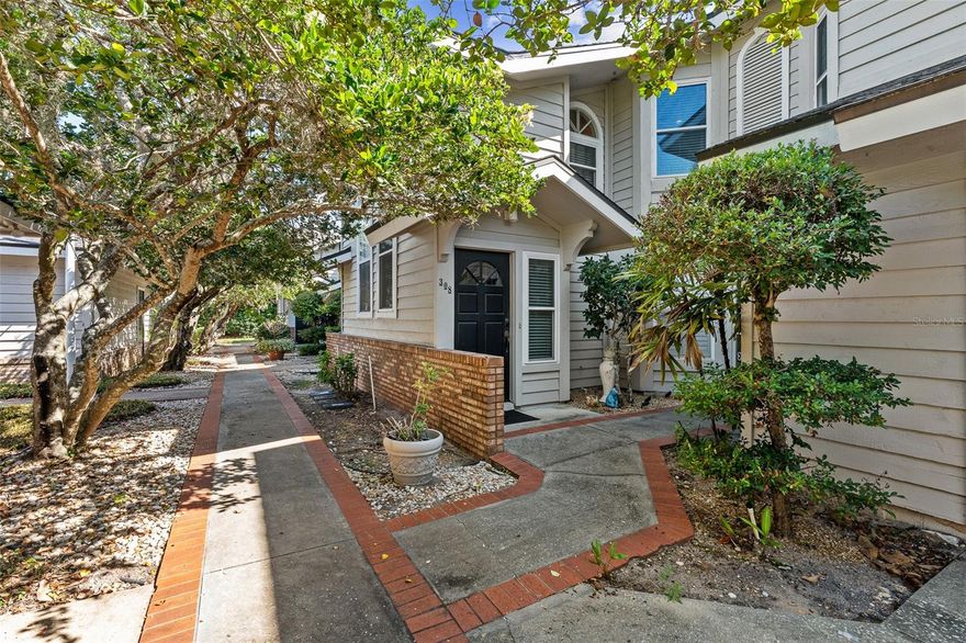 Welcome to maintenance-free living in the heart of Ormond Beach! This freshly painted 2-bedroom, 2-bath condo offers 1,294 living square feet and a unique two-story layout with a private foyer entry downstairs leading up to the main living area. Inside, you’ll find an inviting living room with soaring ceilings and a cozy corner wood-burning fireplace, creating the perfect space to relax or entertain. The eat-in kitchen offers plenty of cabinet space, while the spacious primary suite features its own ensuite bath and private access to the screened balcony. The balcony can also be accessed from the living room, offering a peaceful outdoor retreat with room to unwind. A generously sized guest bedroom and second full bath provide comfort for family or visitors. Additional highlights include abundant interior storage, a separate exterior storage room, washer and dryer included, and a detached 2-car garage complete with opener and access door. Conveniently located near shopping, dining, and everything Ormond Beach has to offer, this condo combines comfort, functionality, and low-maintenance living all in one!