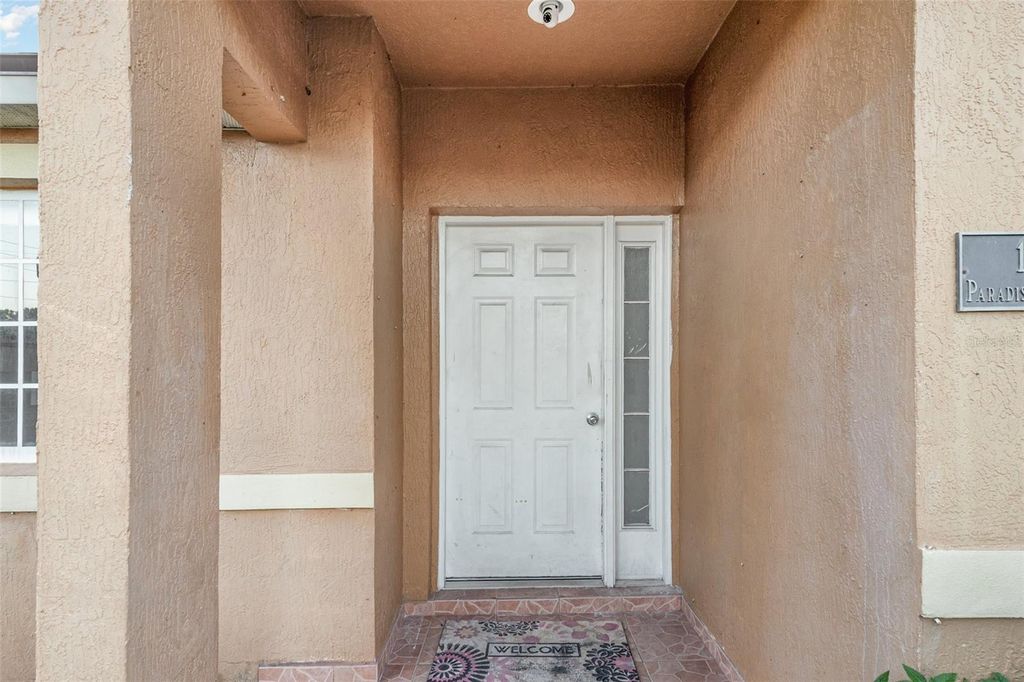 Photo of 105 Paradise Woods Court, Davenport, FL 33896 (MLS # TB8439417)