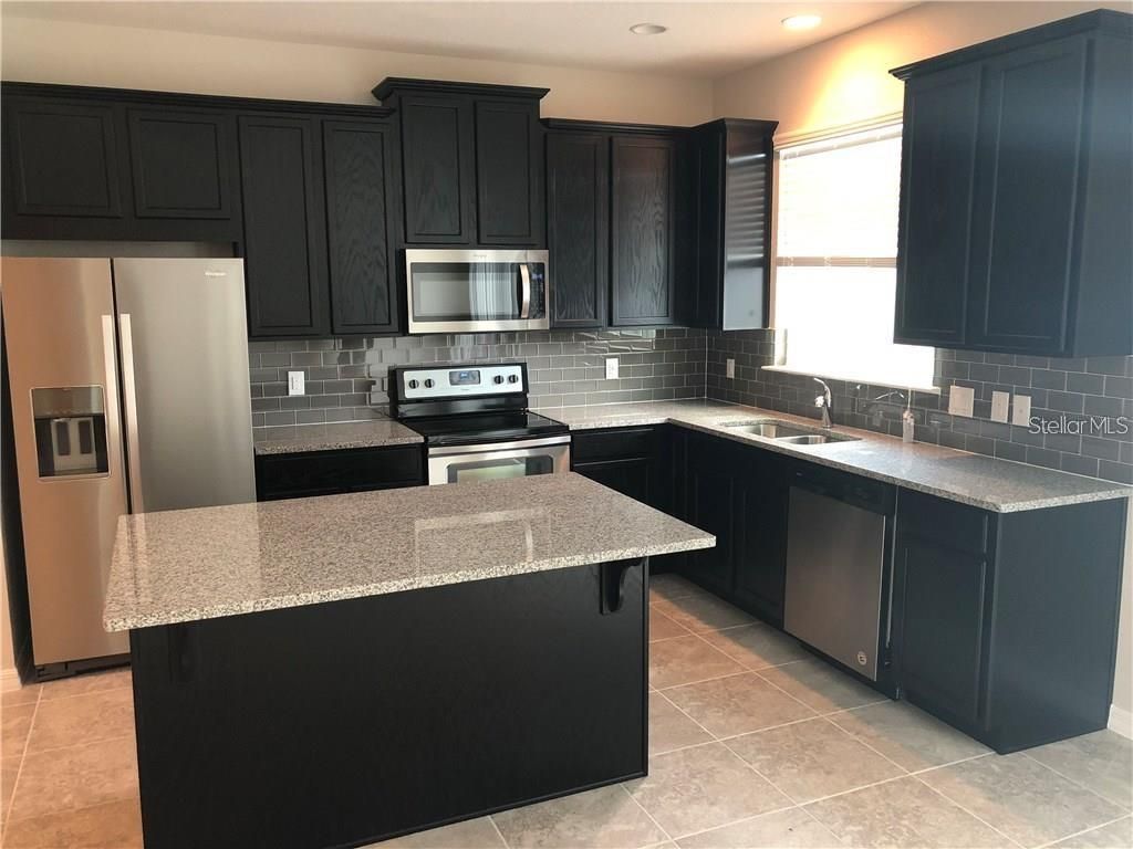 Photo of 3545 Brighton Park Circle, Orlando, FL 32812 (MLS # O6395709)