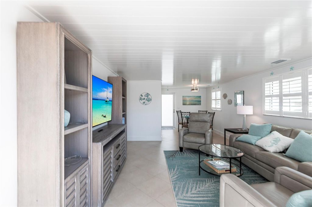 Photo of 6154 Midnight Pass Road #A1, Sarasota, FL 34242 (MLS # TB8468821)