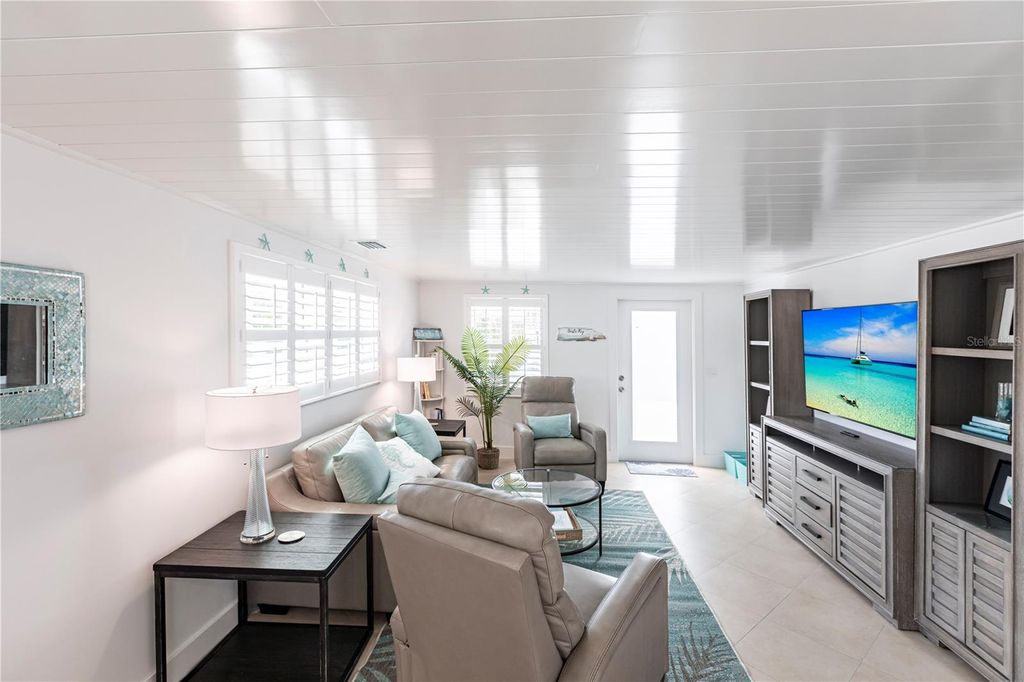 Photo of 6154 Midnight Pass Road #A1, Sarasota, FL 34242 (MLS # TB8468821)