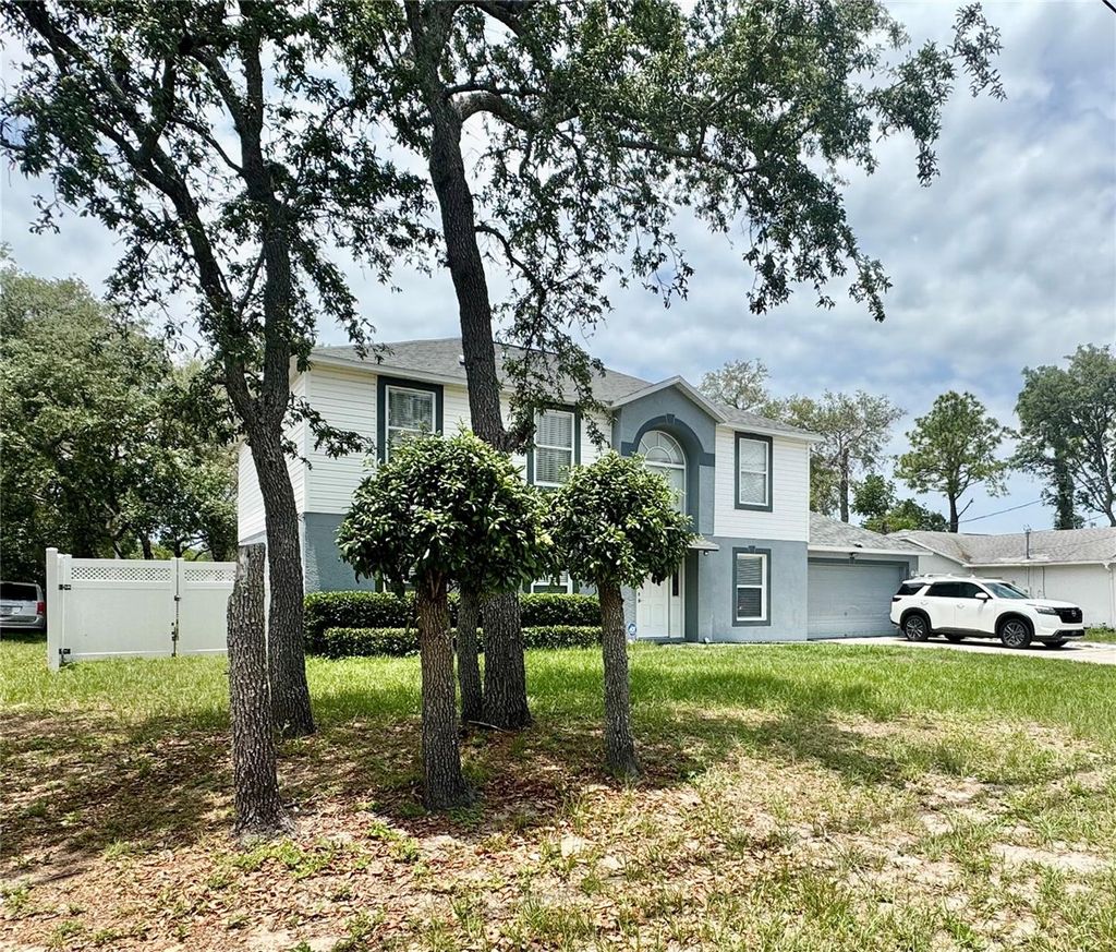 Photo of 3181 Deltona Boulevard, Spring Hill, FL 34606 (MLS # TB8388374)