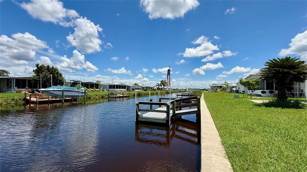 Photo of 716 Blackburn Boulevard, North Port, FL 34287 (MLS # C7511559)