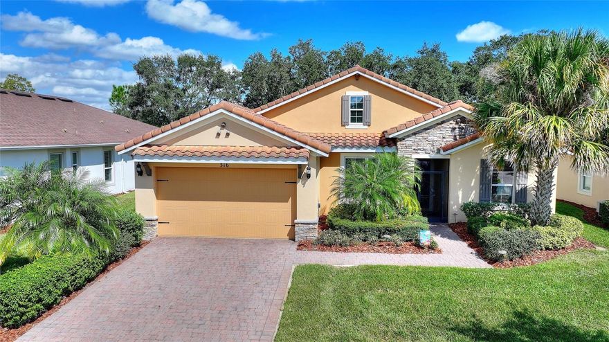 Welcome to your dream home! Located at 316 Treviso Drive, this rare 18th fairway GOLF COURSE residence in Central Florida's acclaimed, award winning Solivita community offers an exquisite lifestyle. Experience the charm of the Tuscan-style Savona model featuring not one, but TWO OWNER'S SUITES alongside stunning views of the 18th hole. The exterior greets you with a stacked stone facade, a beautiful barrel tile roof, and mature oak trees, providing splendid curb appeal. JUST A SHORT STROLL AWAY, you’ll find the village and all its amenities. Enter through the screened portico and leaded-glass front door into a warm, open layout that seamlessly adapts to your lifestyle. Inside, upgraded tile flooring flows through public spaces, complemented by elegant 8' doors and soaring ceilings. The french-door den/flex room is an ideal spot for work or relaxation. For entertaining, the GOURMET KITCHEN shines with soft cream cabinetry highlighted by copper glaze, under-cabinet lighting, QUARTZ countertops, and a striking marble and glass backsplash. Gather around the oversized curved island for meals or socializing, making unforgettable memories in the expansive great room equipped with SURROUND SOUND. Step through the 12’ sliders to reach your inviting lanai — a full-width screened and partially covered outdoor space, perfect for relaxation or entertaining. You'll enjoy unobstructed views over the fairway, where you can wake up to gentle sunrises and unwind in the evening shade, with no rear neighbors to disrupt the tranquil beauty. The two luxurious owner’s suites serve as personal retreats, boasting plush carpet, double-racked closets, and spa-like baths featuring rich cabinetry and designer accents. Additional accommodations include a 3rd bedroom and a full bath, perfect for hosting guests. The home’s thoughtful layout presents a convenient drop zone off the garage and a well-placed laundry room, ensuring efficiency. This property exemplifies comfort, elegance, and a vibrant lifestyle, ready for you to make it your own. Opportunities like this are rare, so don’t wait! Arrange your showing of this stunning estate within Solivita’s dynamic 55+ community. With amenities such as 14 pools, 2 championship 18-hole golf courses, tennis, pickle-ball, basketball, softball, and over 240 clubs, plus spa services and two state-of-the-art exercise facilities spread across 4,200 acres of conservation, you'll have everything you need at your fingertips. Enjoy additional perks such as landscaping, irrigation, high-speed fiber internet, and TV included in the HOA. For your convenience, HCA Florida Poinciana Hospital is directly across the street along with a 42,000 square-foot medical office building. Also recently opened across the street is the new Poinciana Lakes Plaza. Here are some of the stores that have already opened or will be opening soon: Sprouts Farmers Market, Petco, Rack Room Shoes, 5 Below, Ulta, TJ Maxx, Ross, Burlington, TD Bank, Outback Steak House, First Watch Restaurant, Five Guys, Popeye's, Bojangles, Coldstone; along with current Walgreens, Wells Fargo, Little Caesars, McDonald's and more! Please do not hesitate to come see this gorgeous home and perhaps make it your new Solivita home!