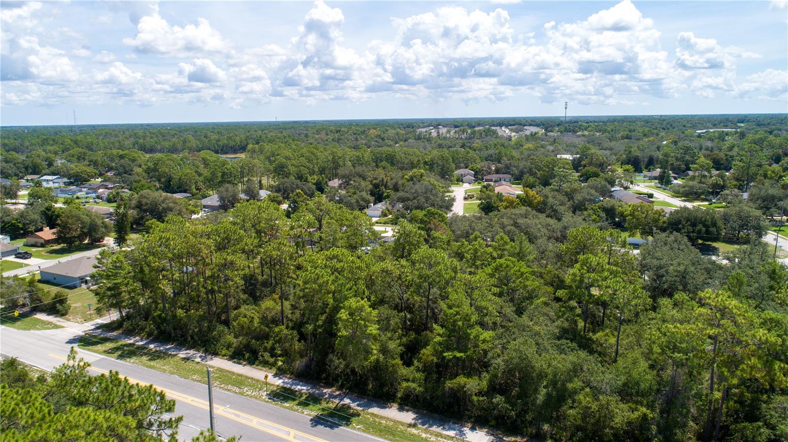 Excellent opportunity to acquire a commercially zoned vacant lot in a highly visible and convenient location in Deltona. This parcel offers paved road frontage on S Courtland Blvd, providing great exposure and accessibility for a variety of business uses. With commercial zoning in place (buyer to verify approved uses with the City of Deltona), this property is well-suited for office, retail, professional services, or future development. Utilities are located nearby, making this an attractive site for investors, developers, or business owners looking to establish a presence in a growing Central Florida market.