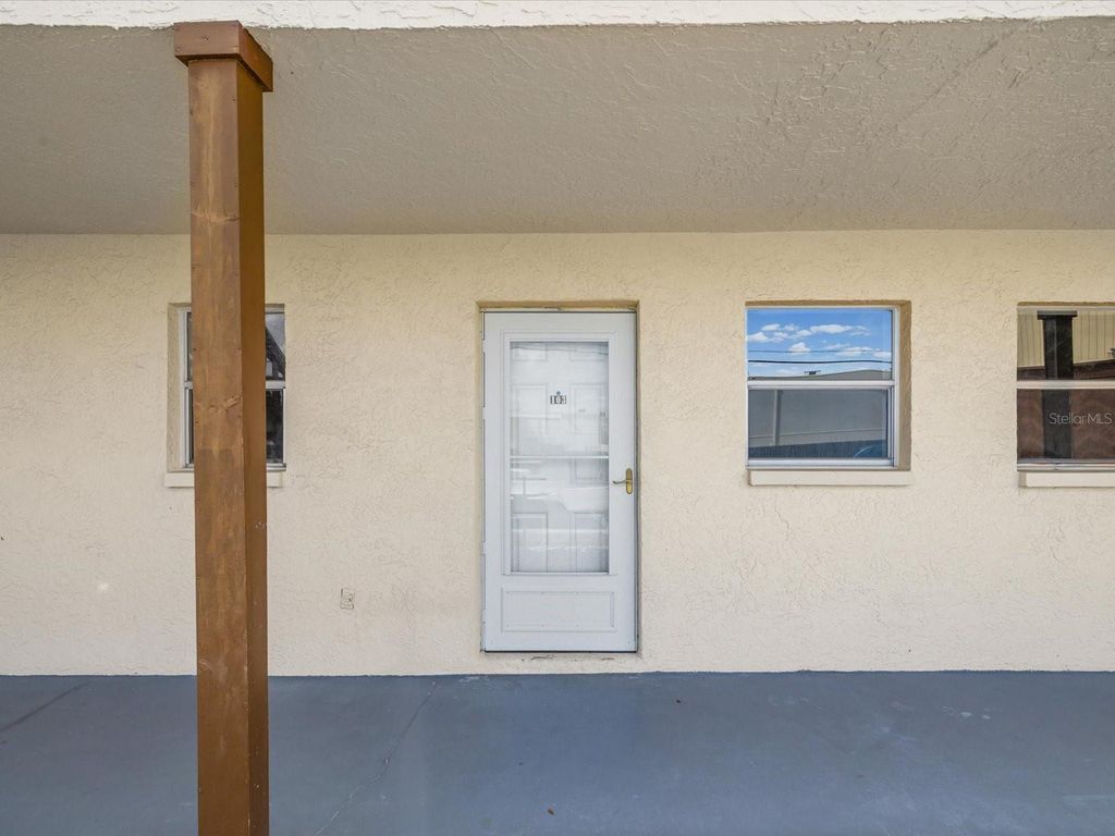 Photo of 5135 Gemstone Drive #103, New Port Richey, FL 34652 (MLS # TB8491850)