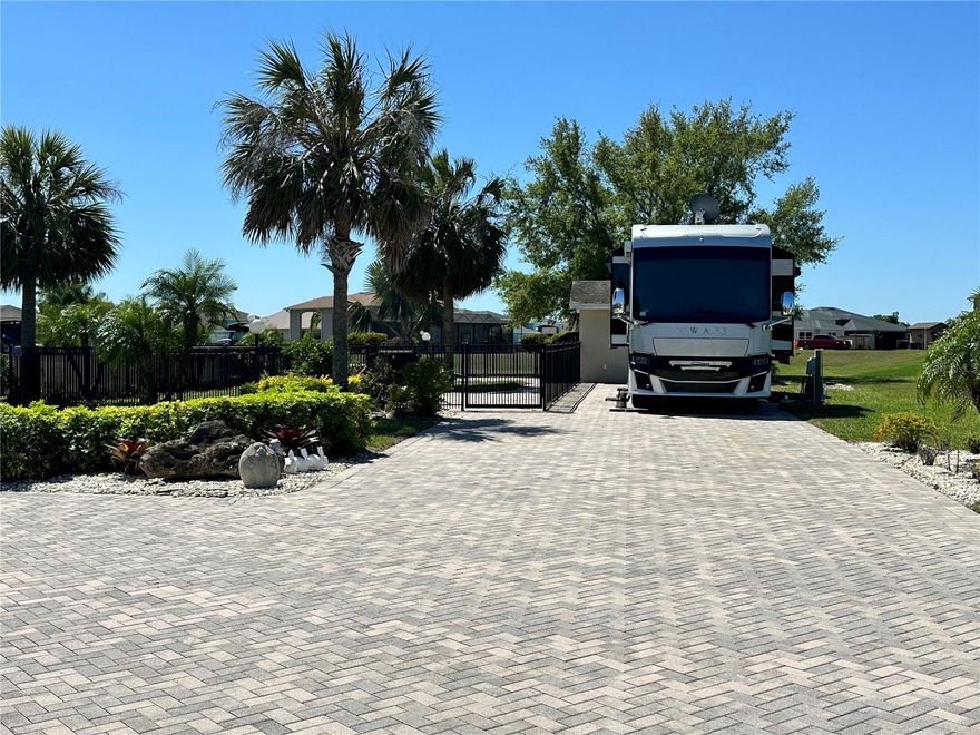 This pad in the sought after community of Mt. Olive Shores North is the perfect winter getaway. The 55+ RV community has plenty of activities with two clubhouses to keep you as active as you would like. The property has it's own private fence for your furry animal or just for entertaining. The storage building is equipped with a washer and dryer, a shower and toilet. Plenty of space to secure your extra items while you enjoy the outdoors. This property offers a deep well for irrigating your lawn. The back of the lot is open to a retention area and has a wonderful breeze all year round for your comfort. Call for an appointment to see this one today.