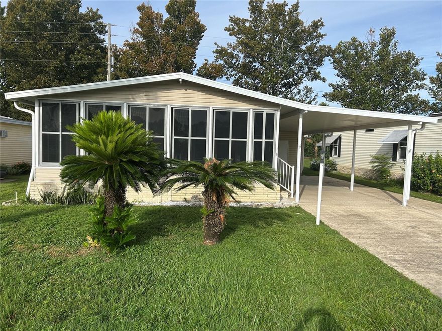 Park East is an age 55+ Resident Owned Cooperative (Co-op) Community. The price of the home includes 1 share of the community ownership valued at $58,200). When you are a shareholder there is no lot rent to pay. The HOA fee for this property is $211.00 monthly which includes Lawn Cutting and Edging, DIRECTV STREAM Cable and Frontier Fiber Optic High Speed WIFI. The clubhouse features an exercise room, library, billiard room and large hall with full kitchen (available to rent for private parties) where loads of community activities take place including Bingo half the year on Thursday nights and community holiday parties. Golf carts ok in community to drive on roads. Come live in this well sought after community and also enjoy the beautiful picturesque lakefront with 2 boat docks and picnic area. Executive public 9 hole golf course surrounds this beautiful community. Incredible picturesque lakefront with picnic area ,bbq's and firepit private boat ramp docks and fishing pier. Pool area with lounges, heated pool with relaxing spa. 15 minutes to Disney property. Taxes are paid to Polk County.

WELL MAINTAINED 1040 SQ FT 2 BEDROOM 2 BATH PROPERTY FEATURING UPDATED WINDOWS, CERAMIC TILE FLOORS. HUGE LANAI WITH THERMAL WINDOWS AND UPDATED WINDOWS THROUGHOUT HOME. SIZEABLE GOLF CART GARAGE / SHED. ROOF APPROX 6 YEARS OLD. AIR CONDITION SERVICED YEARLY INCLUDES BLUE LIGHT TECHNOLOGY FOR MOLD, THE UNIT IS 15 YEARS OLD BUT LIGHTLY USED THROUGH THE YEARS BY A HOMEOWNER WHO LIVED IN IT LESS THAN 6 MONTHS A YEAR. WHOLE HOUSE WATER SOFTNER SYSTEM.