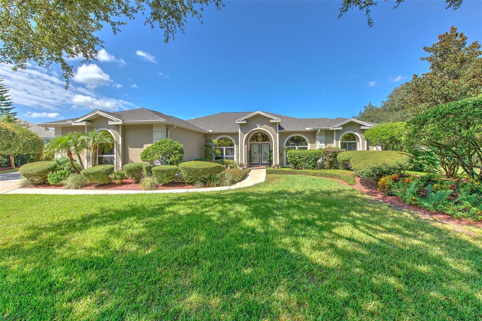 Welcome to this wonderful slice of paradise! This FABULOUS home and property will not disappoint. It is stunningly beautiful & well cared for by the ORIGINAL owners for 30 years! As you roll up, you will immediately notice the well cared for landscaping & the long meandering driveway! Lovely double doors make for a grand entry! With plenty of room for entertaining, the home boasts an open floor plan, split, with the primary suite & office to the right. The kitchen space has been remodeled offering an abundant amount of granite counter space, flowing into the enormous family room! Enjoy our cozy cooler nights around the gas fireplace in this lovely room! The kitchen features walk in pantry, newer appliances, nook area - cabinets abound! As you enjoy your tour, you'll notice three sets of French doors in the home all leading to the spectacular lanai and pool area. Pavers installed in 2020 & resealed in 2021! Bam! While the outdoor area out back is very private, watching the golf activity (putting, chipping, driving) is a fantastic past time! Landscape is perfection! As your day ends, you can enjoy awesome sunsets down the 1st fairway. Auto awnings can be easily extended or retracted as you wish with remote control, TV hook ups and fans for coolin ya off.... ahhhh.... Relax! Let's stroll back inside... the primary bedroom is very oversized featuring 2 walk in closets! Bathroom here has been upgraded, with double sinks and granite, private water closet, large tub and separate shower! All other bedrooms are also very large, with big closets! Both the 2nd & 3rd baths have been redone! Here's yet another WOW feature: Crown molding thru out entire home with beautiful decorative casing around all windows & doors! The windows are all large allowing a bright & joyous feel everywhere! Phenomenal Plantation Shutters on all windows! Medallions enhance the lighting and fans in the home! 50 gallon hot water heater with Easy Flex tank installed in 2024! Newer garage doors are hurricane quality & motor replaced 2019. Three car garage measures a whopping 21 ft deep & 34 ft wide (!!!) so bring your big toys! Well water for irrigation – well replaced in 2024! Solar fan in attic! Yard lights operate on remote control too! Sought after schools, all highly rated, make this the absolute perfect home & neighborhood to call home. River Hills is the jewel of our county with an abundant amount of amenities. Take a stroll out back with your putter, wedge or driver to practice the sport! Or, walk over to the Club for a meal, live Friday night entertainment, playground, pickleball, tennis or even hike on our many trails. Gym membership is included & all completely upgraded summer 2025. Activities abound, yearly, monthly, weekly! For the golfers, new greens & greenside bunkers, fairway bunkers comin’ up! So, welcome to Valrico, River Hills & the extraordinary cul-de-sac property on Culasaja, which could be considered the best lot in the community!! Call/text/email Ellen for your personal tour!