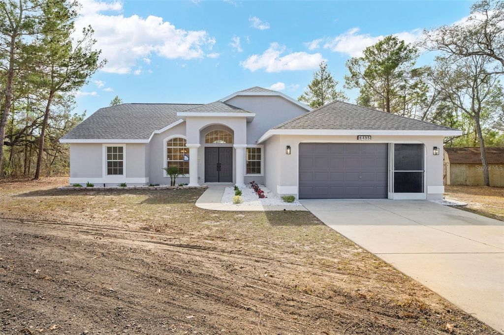 Photo of 8495 Jayson Dr, Brooksville, FL 34613 (MLS # TB8464839)