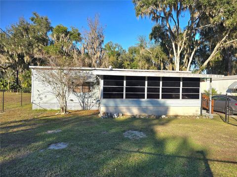 Photo of 920 Cr 452a, Lake Panasoffkee, FL 33538 (MLS # OM715637)