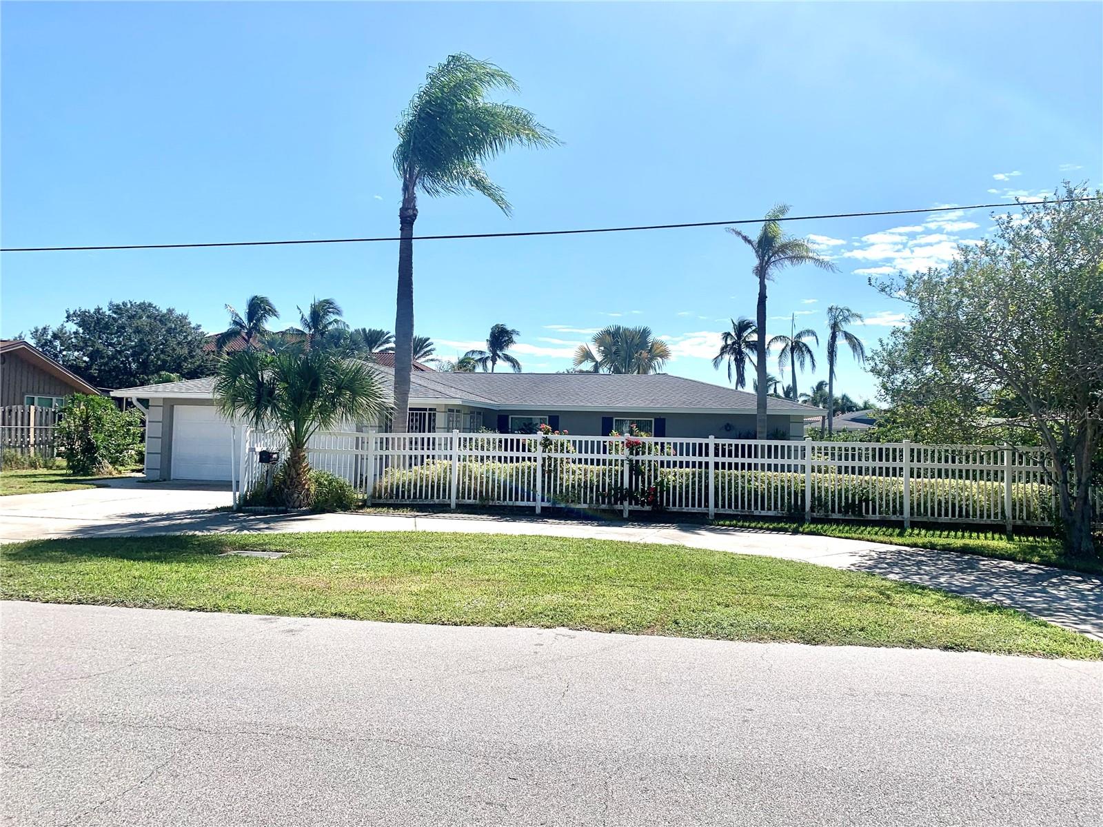 Back on the RENTAL market, after months of post hurricane rehab. Some interior and exterior improvements!
Welcome to Heron's Aqua Breeze! This 3-bedroom 2 1/2 bath canal home with pool is back on the short-term rental market and located just 1 and as half miles to world famous SIESTA KEY BEACH! Spacious and well appointed, this home is equipped for a memory making vacation in a tropical paradise, The kitchen was recently remodeled with beautiful cabinetry and new stone counters and has been stocked with everything you might need for a romantic dinner or fun night with the family. Forget about Starbucks, owners have designated a coffee bar area complete with space and specialty appliances to kick start your mornings to lounge on the large private lanai overlooking the pool and canal with your perfect cup of coffee. Tons of natural light spill into every room and dining room looks right out to the canal. There is a large living room with lots of seating on the new and large luxury leather sectional, but also another gathering room to watch TV, read a book, or eat your eggs while watching the morning news. Owners have also appointed an office area with desk for those guests who have to do a little work. The generous sized primary bedroom has a large walk-in closet and has that Tommy Bahama feel. Two guest bedrooms are in the opposite side of the house, along with a bathroom with walk in and accessible shower. One of those guestrooms has a half bath as well. This neighborhood is the closest you get to Siesta Key. Four bikes are provided for guests, but BRING YOUR OWN BOAT, as this home has deep water docking outside your back door and it only takes 4 minutes to get to the Gulf of Mexico! Gorgeous view in the breezy back yard as it is lined with multimillion dollar estates that you will enjoy looking at while you are sipping your late afternoon libation. Go ahead and fire up that gas grill too, because sometimes you just want to stay in tank tops and shorts while enjoying the perfect temperatures Sarasota has to offer. This location is near great restaurants, shopping, and grocery/drug stores. Exterior of home has a driveway in front of a 2 car garage and circular drive space. When you are a guest here, you can't miss Sarasota's exceptional arts and theatre happenings, along with the very hyped about bustling downtown area, and thriving Main Street, located just 5-7 miles away. This property is a slice of heaven, feeling very private, and very casual. Owner will also consider an annual.