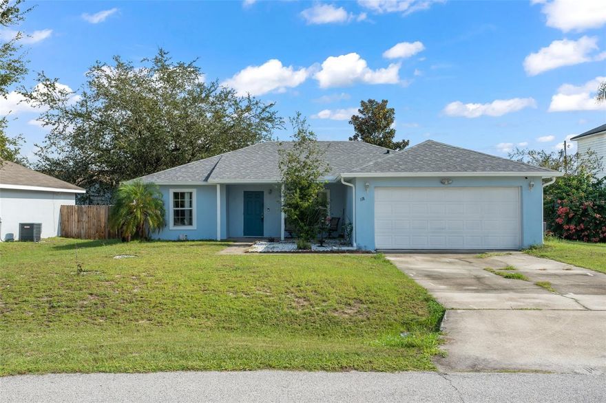 Look no further than this 3-bedroom, 2-bathroom move-in ready home located in Poinciana Village with a brand new roof from August 2023! As you enter the foyer, you’re provided direct views into the cozy living room. This space circles around into the beautiful kitchen with quartz countertops, stainless steel appliances, subway backsplash and additional eat in space tucked up at the back. Towards the front of the home is the laundry room that leads out into the 2-car garage. This split floor plan features the primary bedroom right off the kitchen. This spacious room has sliding glass doors leading out to the backyard with an ensuite with tub and separate standing shower. The 2 remaining bedrooms and full bathroom are across the way located off the living room. Out back is a fully fenced in yard that is currently home to the blank canvas backyard of your dreams! Conveniently situated in Poinciana, with close proximity to theme parks and local attractions, this home provides access to a thriving Florida lifestyle! Schedule your private showing today!
