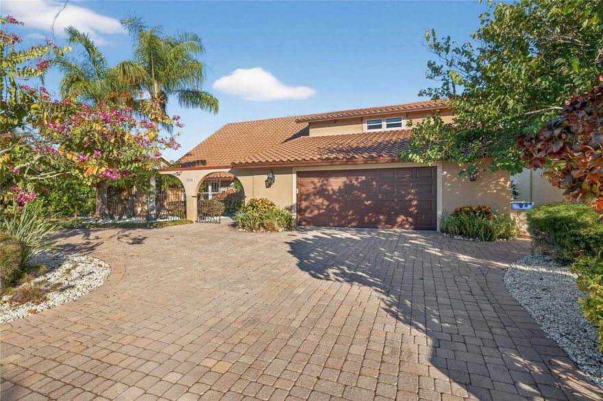 One or more photo(s) has been virtually staged. Welcome to your dream waterfront retreat! This stunning 2-story pool home boasts 4-bedrooms, 3.5-bathrooms and offers the perfect blend of luxury, comfort, and Florida lifestyle. Nestled on a deep canal with direct Gulf access, it’s a boater’s paradise—just minutes to the open gulf waters!

Step inside to discover a beautifully designed interior with modern upgrades throughout, spacious living areas, and an abundance of natural light. The gourmet kitchen flows effortlessly into the open-concept living space, perfect for entertaining family and friends.
The elegant spiral staircase with real wood flooring and iron spindles leads you to the second floor, where you have 3 guest bedrooms and additional guest bathroom. The owner's suite has a beautiful large remodeled bathroom and walk in closets.  This master suite also has french doors that lead to a large upper deck that looks down the canal.  A perfect place to sip your coffee in the mornings or to sip a glass of wine while looking at the view to the open gulf.  On cooler evenings, cozy up by the wood-burning fireplace while taking in the serene water views. 

Outside, enjoy your own private oasis featuring a sparkling pool, outdoor kitchen, expansive lanai, 75 feet of seawall with an oversize floating dock with electrical connections, ideal for accommodating a large vessel it also has a separate 12,000 pound boat lift with breathtaking canal views.  Since owning the home, the seller has spent over $167,000+ in upgrades on home improvements, including new hurricane impact windows and doors. The oversized double-car garage provides plenty of room for vehicles, storage, and even a golf cart—ideal for exploring this golf cart-friendly community.

Residents also enjoy access to a private beach, where sunsets and coastal breezes await. For only $200.00 a year you can join the beach club where they host beach parties and concerts. The Gulf Harbors Civic Association is only $125.00 a year this is optional and it is to maintain two private boat ramps within the community and the club house which also hosts many fun events and is available to rent for big private parties you may have!   With its prime location, premium upgrades, and unbeatable waterfront setting, this home truly has it all.

Don’t miss your chance to own this must-see Gulf-access gem—schedule your private tour today!