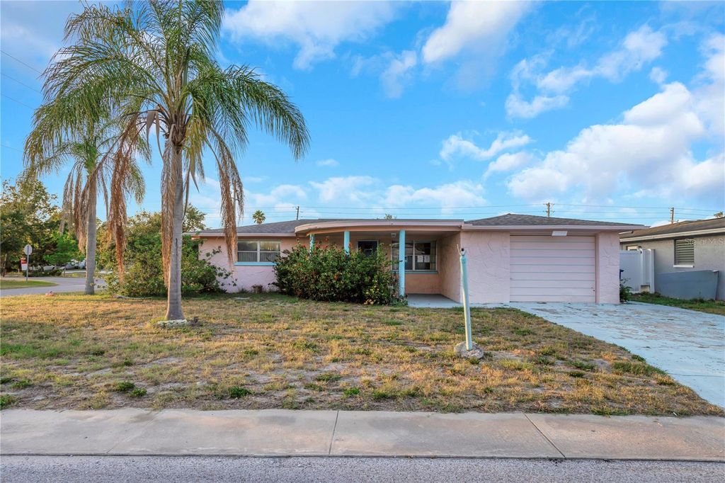 Photo of 3243 Eisenhower Drive, Holiday, FL 34691 (MLS # TB8385511)