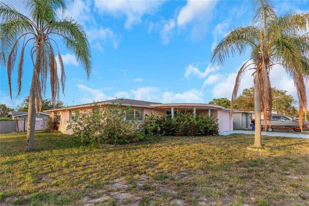 Photo of 3243 Eisenhower Drive, Holiday, FL 34691 (MLS # TB8385511)