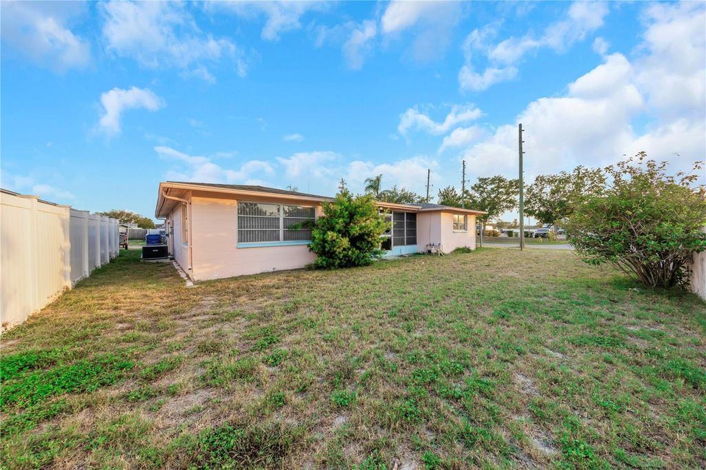 Photo of 3243 Eisenhower Drive, Holiday, FL 34691 (MLS # TB8385511)